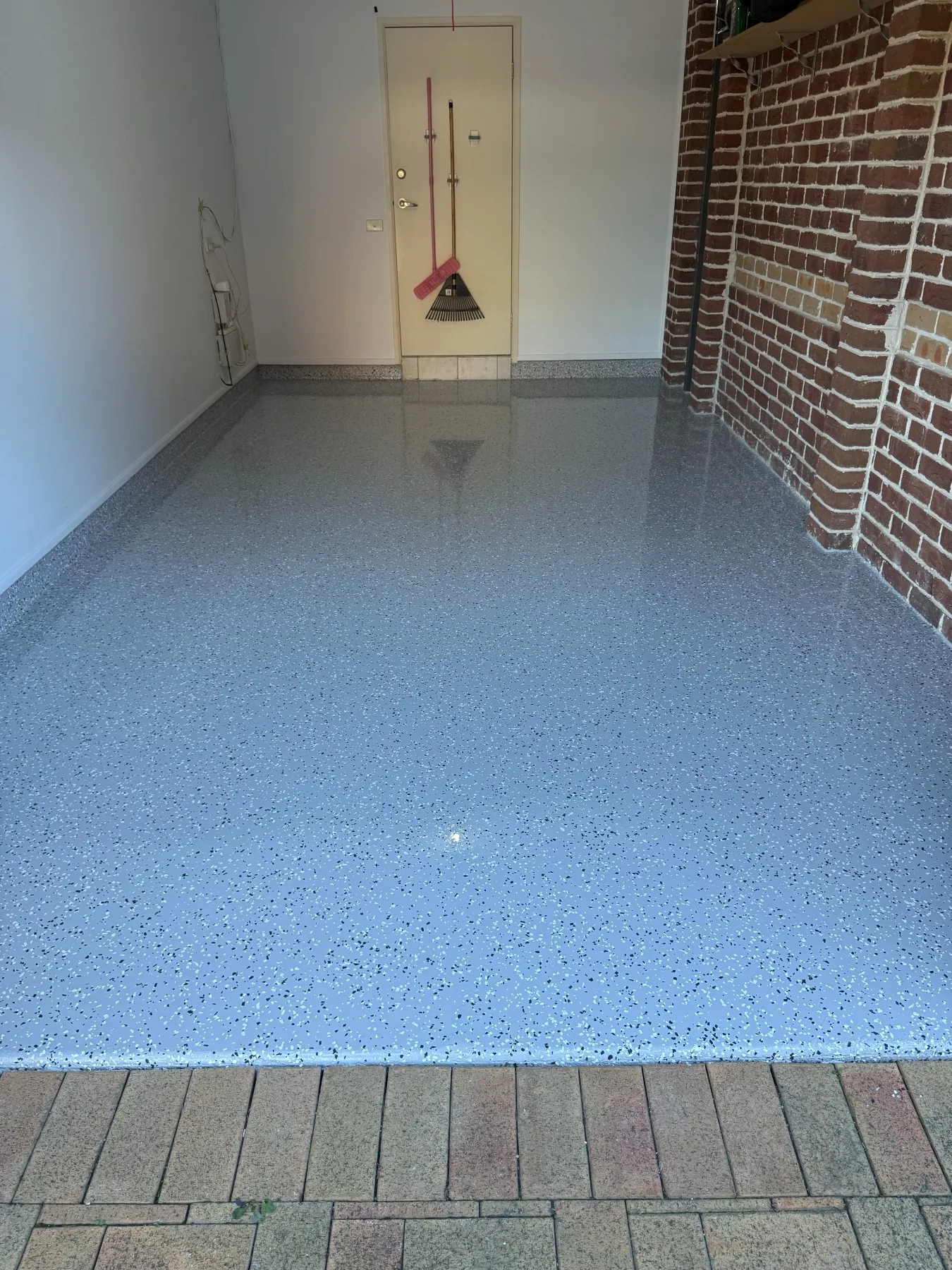 Light grey partial flake epoxy garage floor with Blue Storm flakes in Blacktown