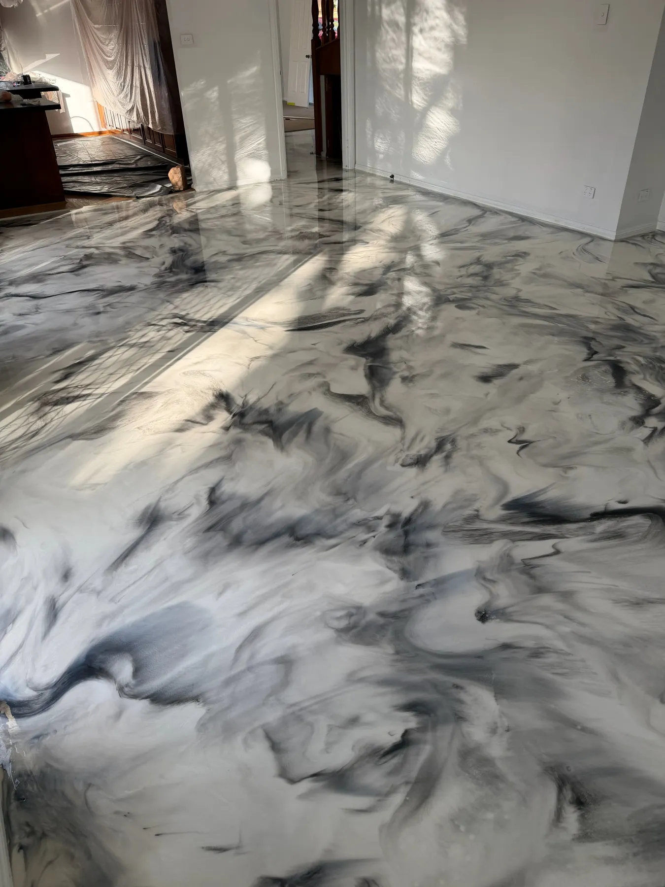 Pearl white and silver black marble metallic epoxy floor in Doonside